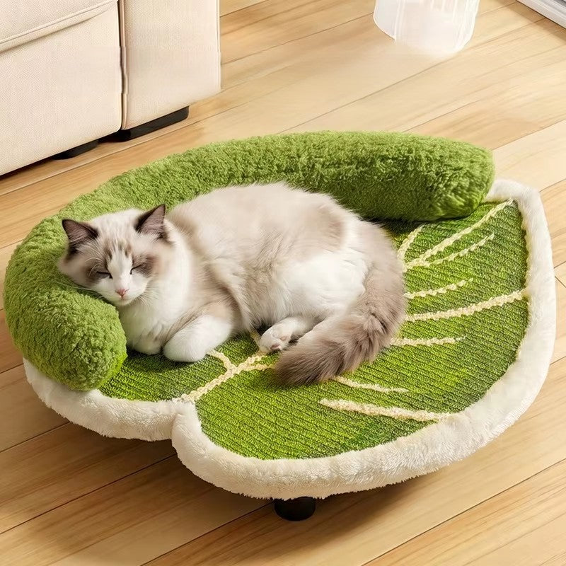 coussin chat vert et blanc en forme de feuille confortable