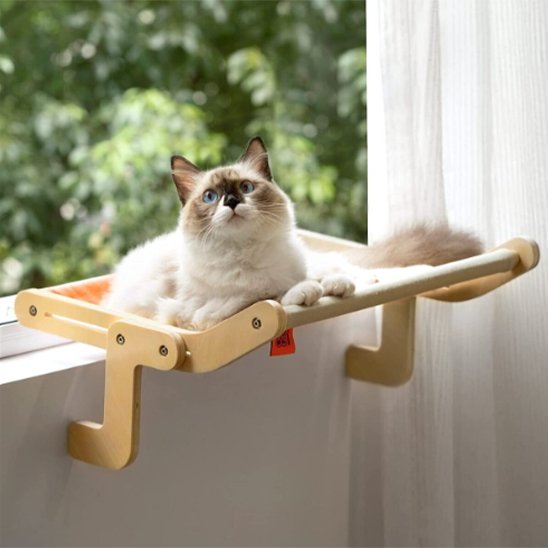 hamac radiateur pour chat avec un chat couche dedans