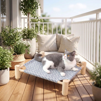 hamac chat bois toile tendue bleue avec motifs blancs