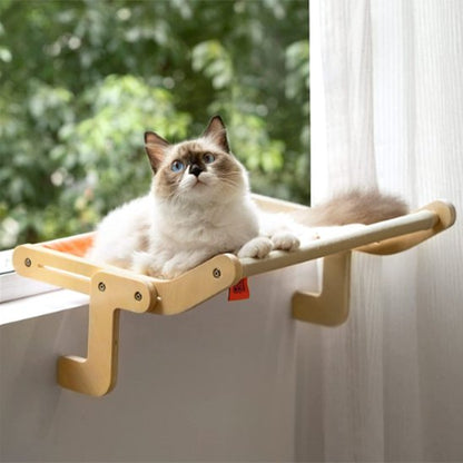 hamac radiateur pour chat avec un chat couche dedans