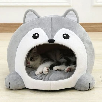 Maison pour chat forme de husky gris et blanc avec chat dormant dedans