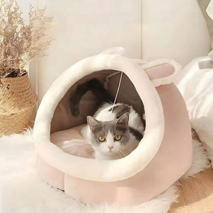 Niche chats forme tete lapin rose grande ouverture avec chat dedans
